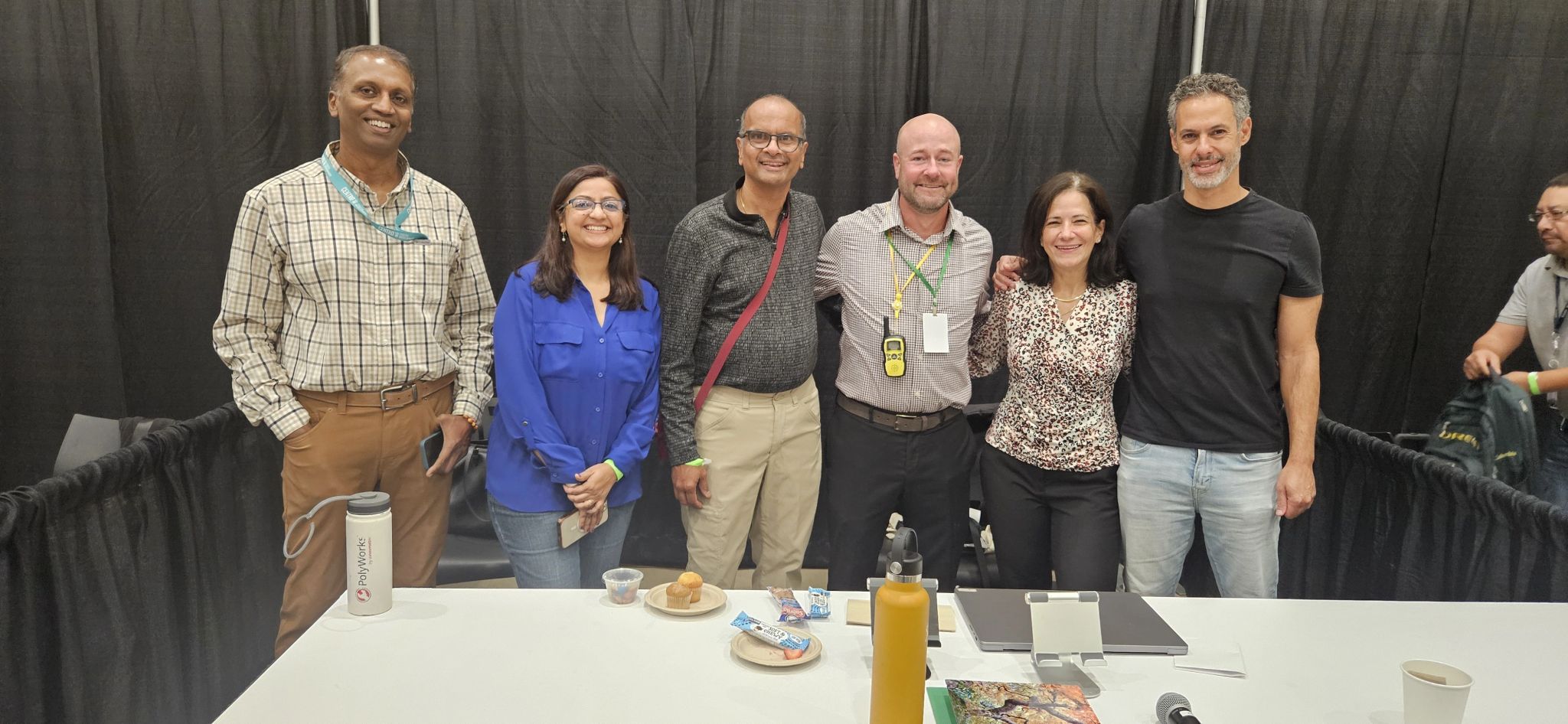 Worksystems collaboration planning across a whiteboard.